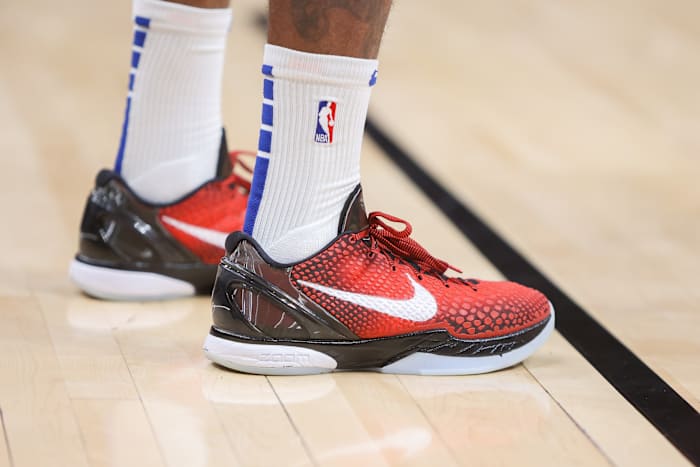 View of the red and black Nike Kobe 6 basketball shoes.